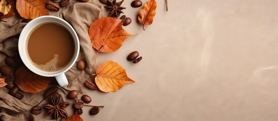 Aufkleber - Flat lay composition in autumn or winter with a coffee cup dry leaves and dried orange on a linen fabric background Copy space available representing autumn or fall