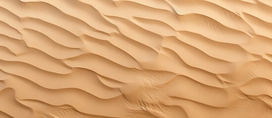 Wall Mural - sandy beach in spain with a wavy texture seen from above
