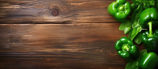 Leinwandbilder - Green pepper on wood