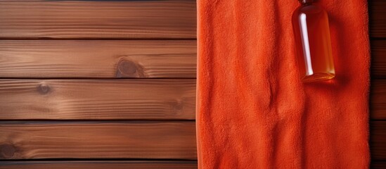 Leinwandbilder - Top view of shower gel and washcloth on wooden background