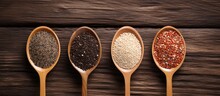 Top Down View Of White Red And Black Quinoa Seeds On Wooden Background With Room For Text