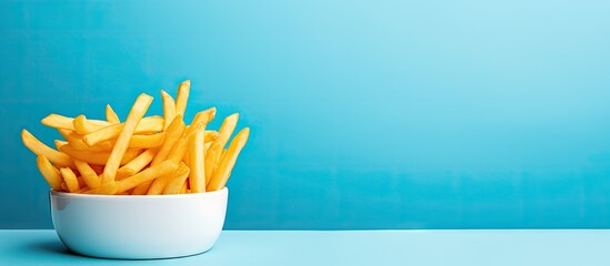 Poster - Delicious fries on pale blue backdrop