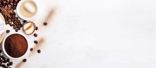 Poster - Top view of white background with coffee scented spa salt oil loofah and soap representing the concept of aromatherapy and spa Ample border for copying space