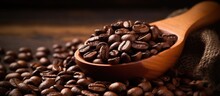 Roasted Coffee Beans In Wooden Scoop On Brown Background With A Blank Area