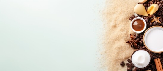 Poster - Top view of white background with coffee scented spa salt oil loofah and soap representing the concept of aromatherapy and spa Ample border for copying space