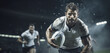 Portrait of a rugby player running with ball in stadium. Sports concept.