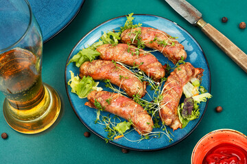 Wall Mural - Beer mug and grilled sausages.