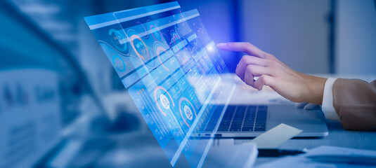 business hand touching on laptop computer with big data technology and data interface science, busin