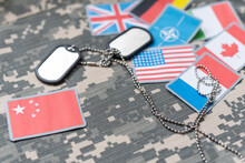 USA And North Korea Military Relations, Identification Dog Tags On Digital Camouflage Fabric. 3d Illustration