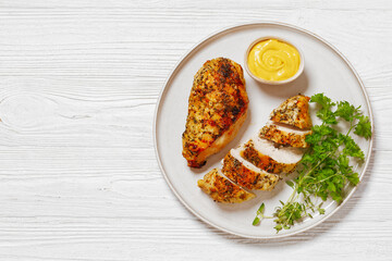 Canvas Print - Baked Split Chicken Breasts on plate, top view