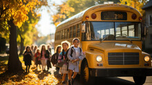 Back To School. Cute Schoolgirls, Schoolboys And School Bus In The Autumn Park.