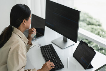 Wall Mural - developer programmer working to checking code on monitor while programming to developing website