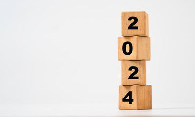 Wall Mural - 2024 wooden block cube stacking for preparation merry christmas and happy new year concept.