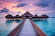 © lublubachka - Beautiful Maldives travel concept with willas on the water, sunset vibes