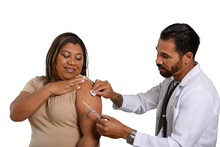  A Health Worker Vaccinates A Woman In The Arm, Adult Vaccination
