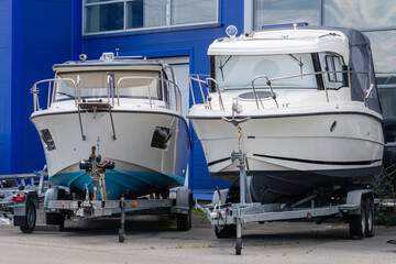 Two boats on car trailers. High quality photo