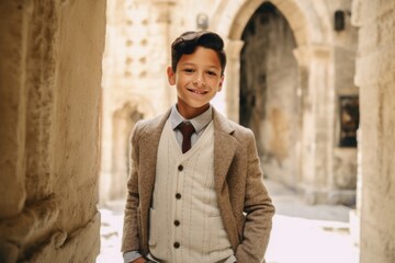 Wall Mural - Lifestyle portrait photography of a cheerful boy in his 30s wearing a chic cardigan at the crac des chevaliers in homs governorate syria. With generative AI technology