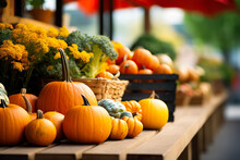 A Colorful Display Of Pumpkins Apples And Gourds At An Autumn Farmers Market Background With Empty Space For Text 
