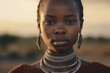 Headshot portrait photography of a content girl in her 30s wearing a delicate lace choker at the serengeti national park tanzania. With generative AI technology