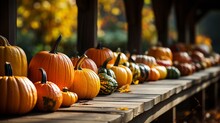 Fallen Leaves And Colorful Pumpkins On A Wooden Veranda..