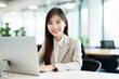 © CYBERUSS - Beautiful Asian Businesswoman Working with Computer, Female Manager Works in Modern Office, Analysis Data Statistics and Business Planning.