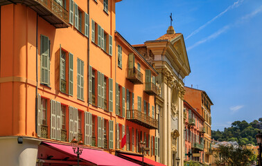 Canvas Print - Picturesque colorful traditional old houses on a street in the Old Town, Vieille Ville in Nice, French Riviera, South of France