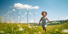  Child Running With A Colorful Pinwheel Amidst Wind Turbines. A Summer Scene Of Blue Skies, Green Hills, And Renewable Energy Generation, Inspiring Eco-Friendly Power For The Future