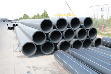 pe pipe plant, industrial pe pipes with blue line for gas and water. hdpe pipe, polyethylene pe100 p