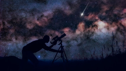 astronomer looking at the starry skies with a telescope.