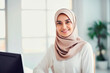 © the_lightwriter - muslim businesswoman in an office