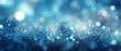 Niebieskie jasne świecące tło brokatowe - bokeh i blur. Na baner świąteczny zimowy. 