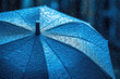 Blue umbrella under the rain