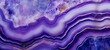 © Corri Seizinger - Closeup of polished abstract purple white agate crystal natural quartz healing stone texture background