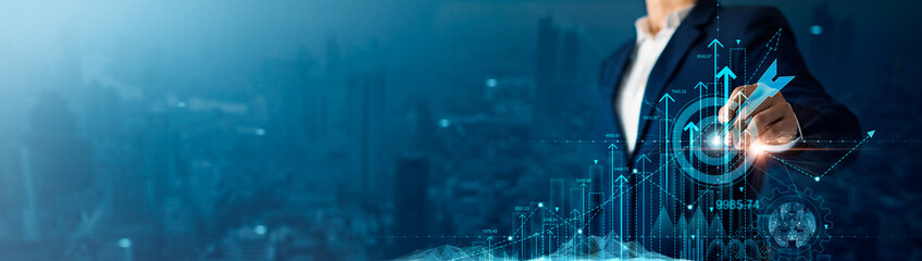 Leinwandbilder - Businessman analyzing and calculating financial data for long term investment growth goals and company finance balance, Business strategy and planning of target. Economic analysis of Digital marketing