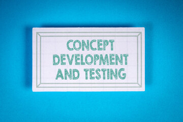 Wall Mural - concept development and testing. cardboard sticker on a blue background