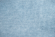Texture Of Light Blue Jeans Close Up. Dark Denim Background.