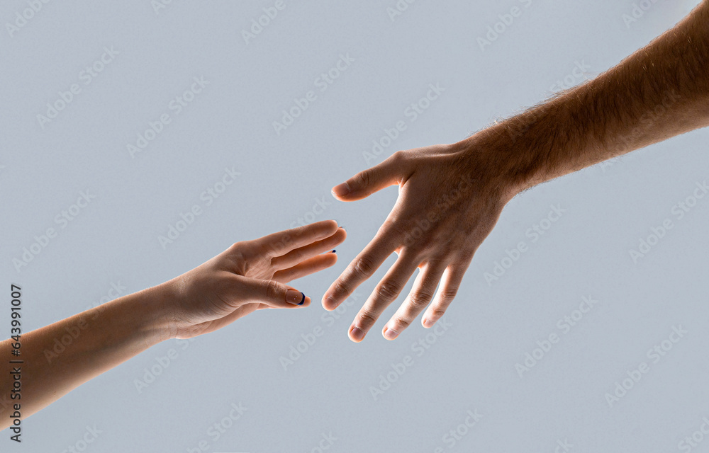 Helping hand outstretched, isolated arm, salvation. Two hands, helping arm of a friend, teamwork