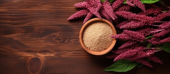 Sticker - Healthy food Amaranth seeds in bowl made of wood isolated pastel background Copy space