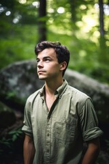 Wall Mural - portrait of a confident young man out in nature