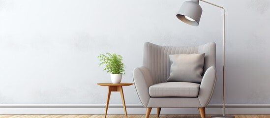 Poster - Contemporary Scandinavian living room or office interior Old gray armchair with white cushion light on isolated pastel background Copy space floor against bright wall horizontal view empty area