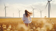© VICHIZH - Nature woman turbine back wind energy run ecology technology generate electricity