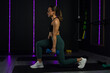 © AntonioDiaz - Sporty woman doing a hiit workout doing lunges