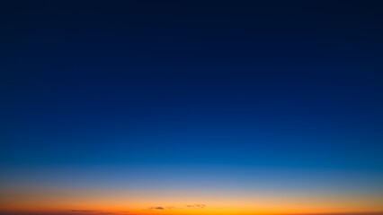 Poster - Color gradient on the sky. Sky with clouds during sunset. Clouds and blue sky. Photo for design and background.