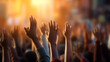 © Daniel - a crowd of people raising their hands at a mass party,