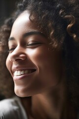  cropped shot of a woman smiling and looking down