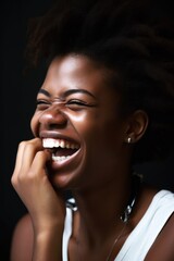 Canvas Print - a young woman laughing while talking on a cellphone