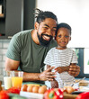 © Lumos sp - child family kitchen food boy son father breakfast happy together fun morning bonding healthy diet eating home black african american man happy kid game childhood cute parent preparing