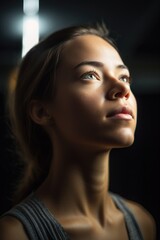 Canvas Print - low angle portrait of a beautiful young woman in yoga class