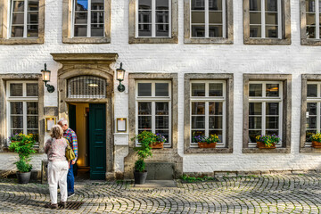 Wall Mural - View of old building with door and windows