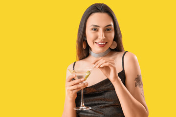 Sticker - Beautiful woman with martini on yellow background